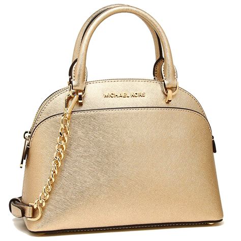 michael kors purses black and gold|michael kors gold evening bag.